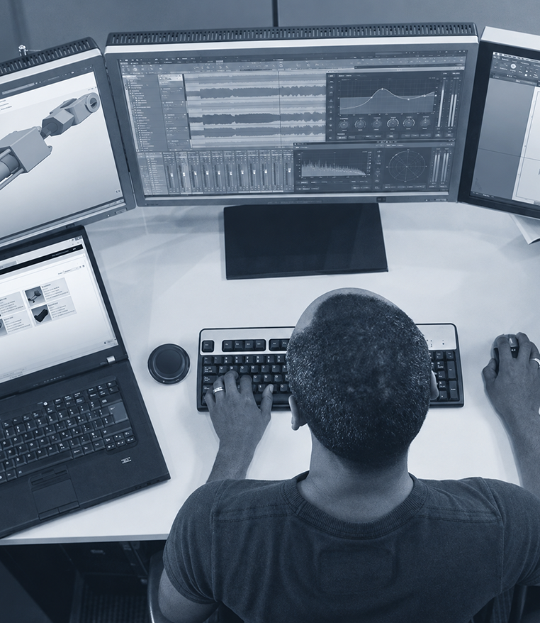 Engineering workstation displaying a detailed CAD product design